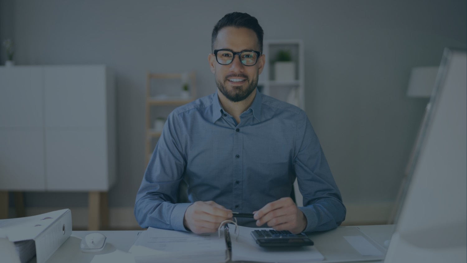 Small business owner reviewing financial reports to drive business growth through effective accounting